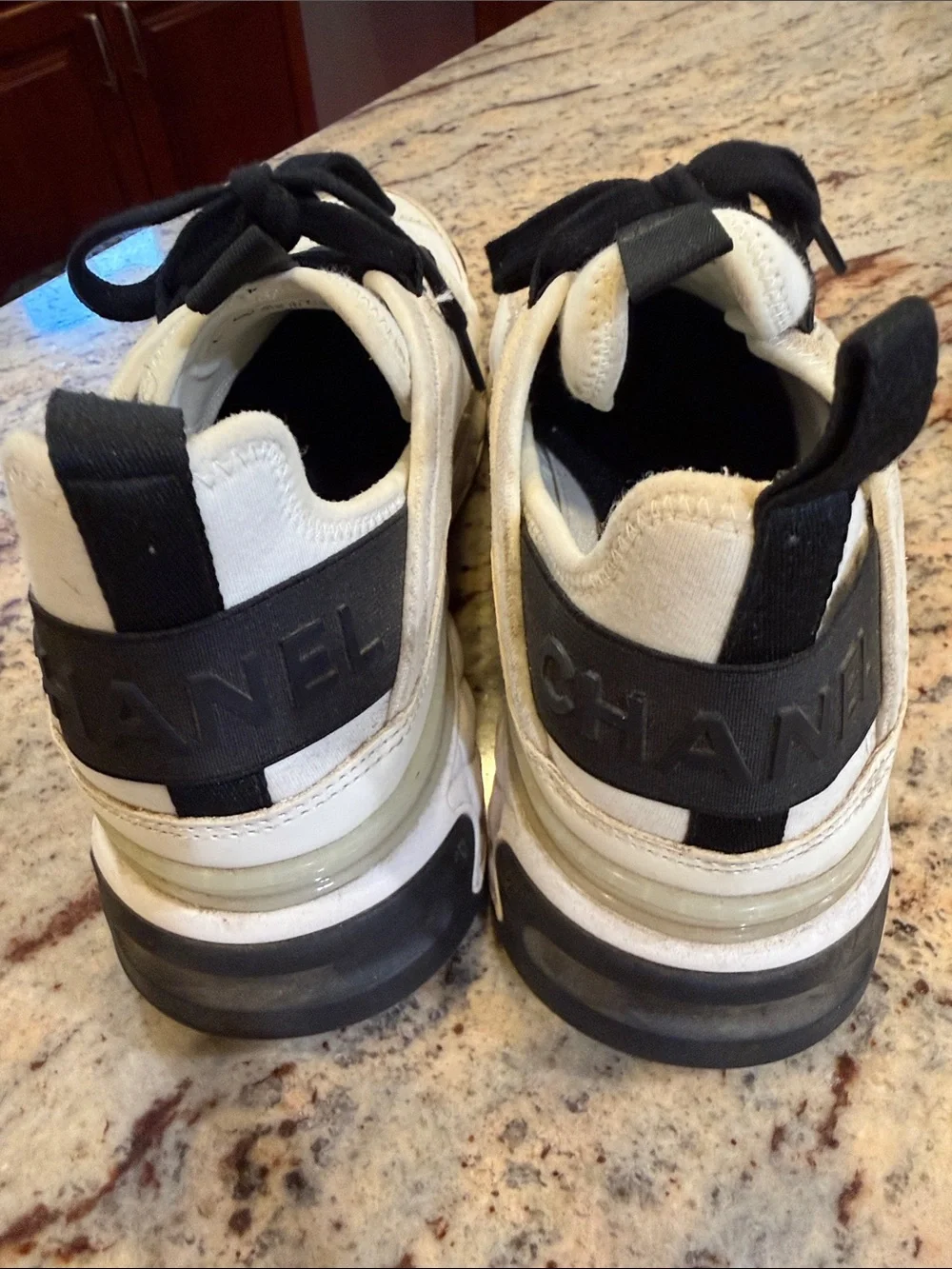 CHANEL Cream and Black Lace-Up Chunky Sneakers